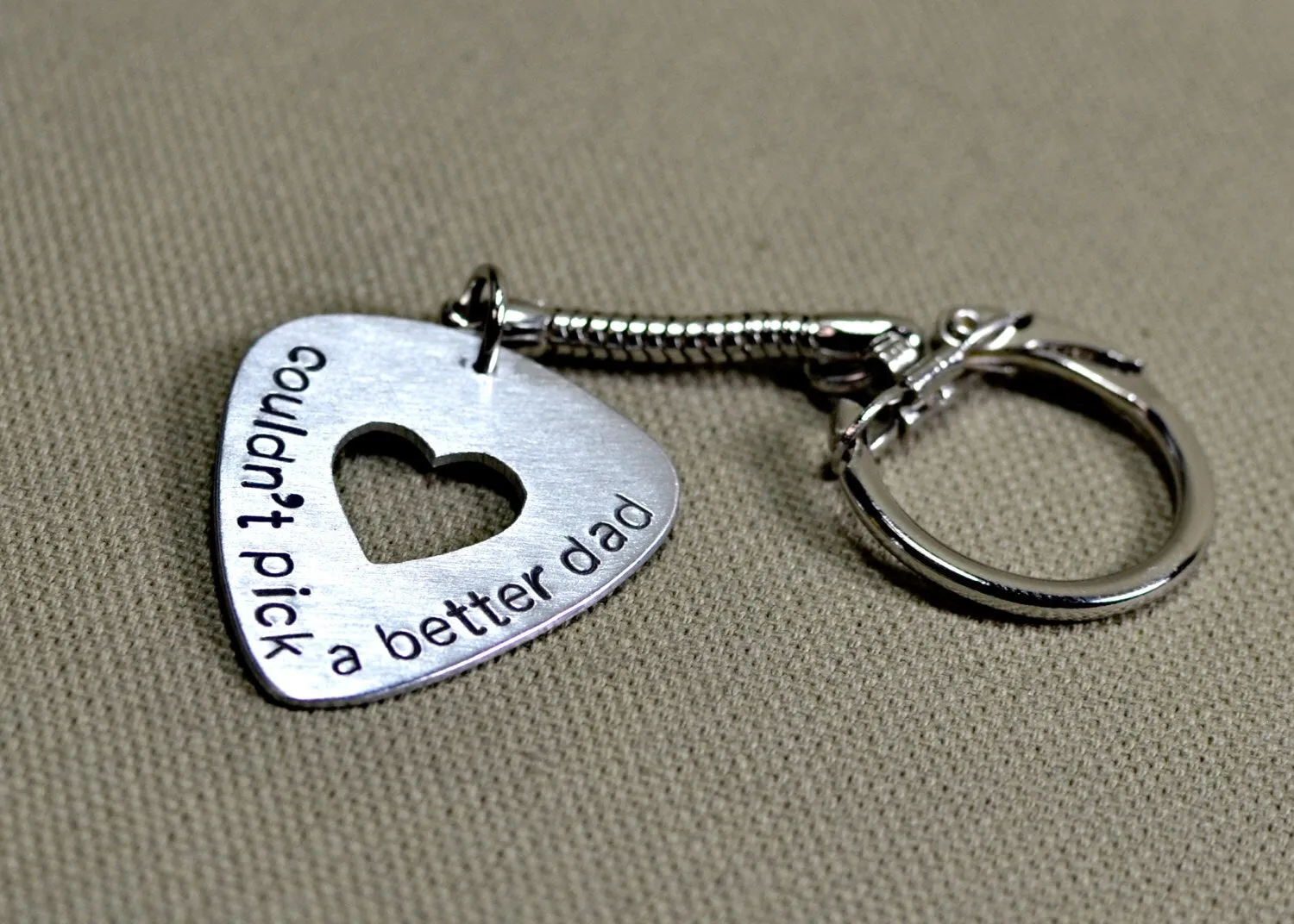 Couldn't pick a better dad on a metal guitar pick keychain