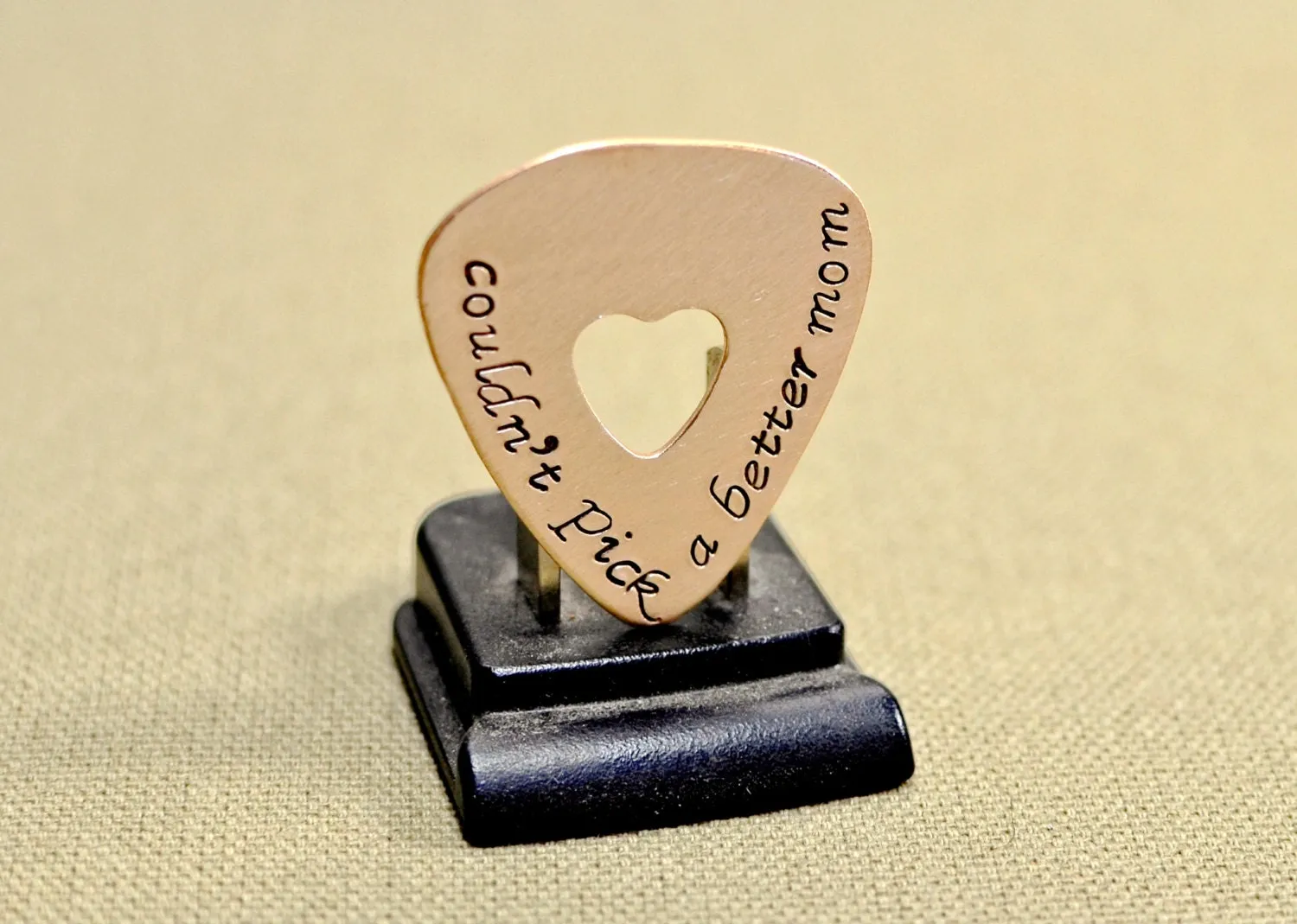 Couldn't pick a better mom guitar pick in bronze
