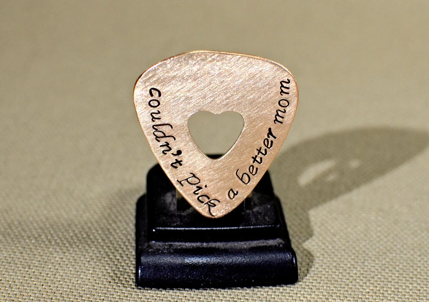 Couldn't pick a better mom guitar pick in bronze