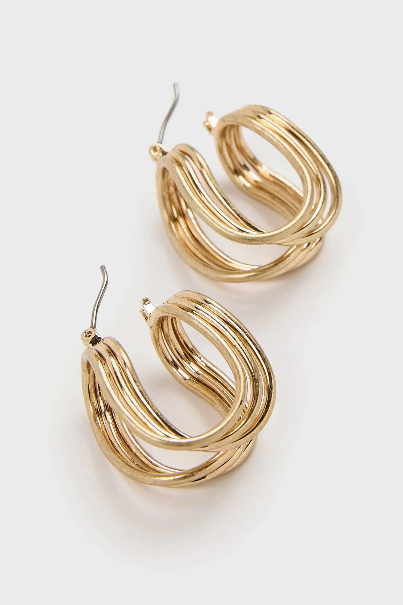Gold looped U earrings