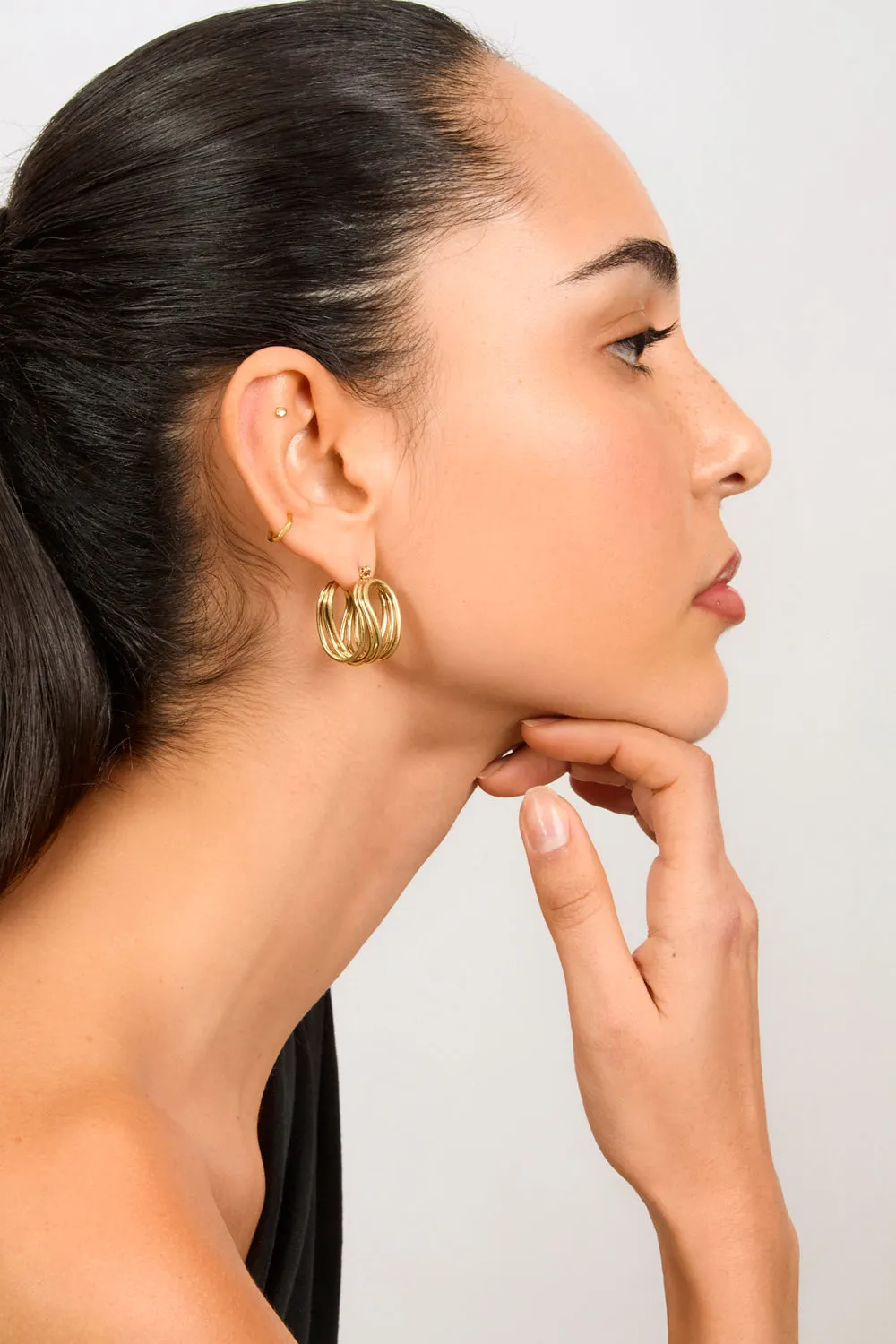 Gold looped U earrings