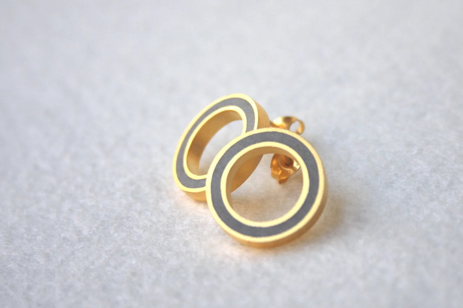 O geometric shaped gold & concrete stud earrings