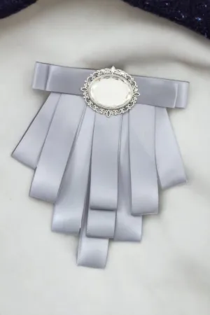Oval Framed Gem Layered Ribbon Brooch