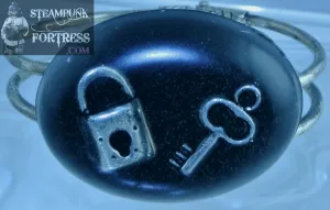 SILVER BLACK OVAL LOCK AND KEY IN RESIN BRACELET CUFF BANGLE STARR WILDE STEAMPUNK FORTRESS