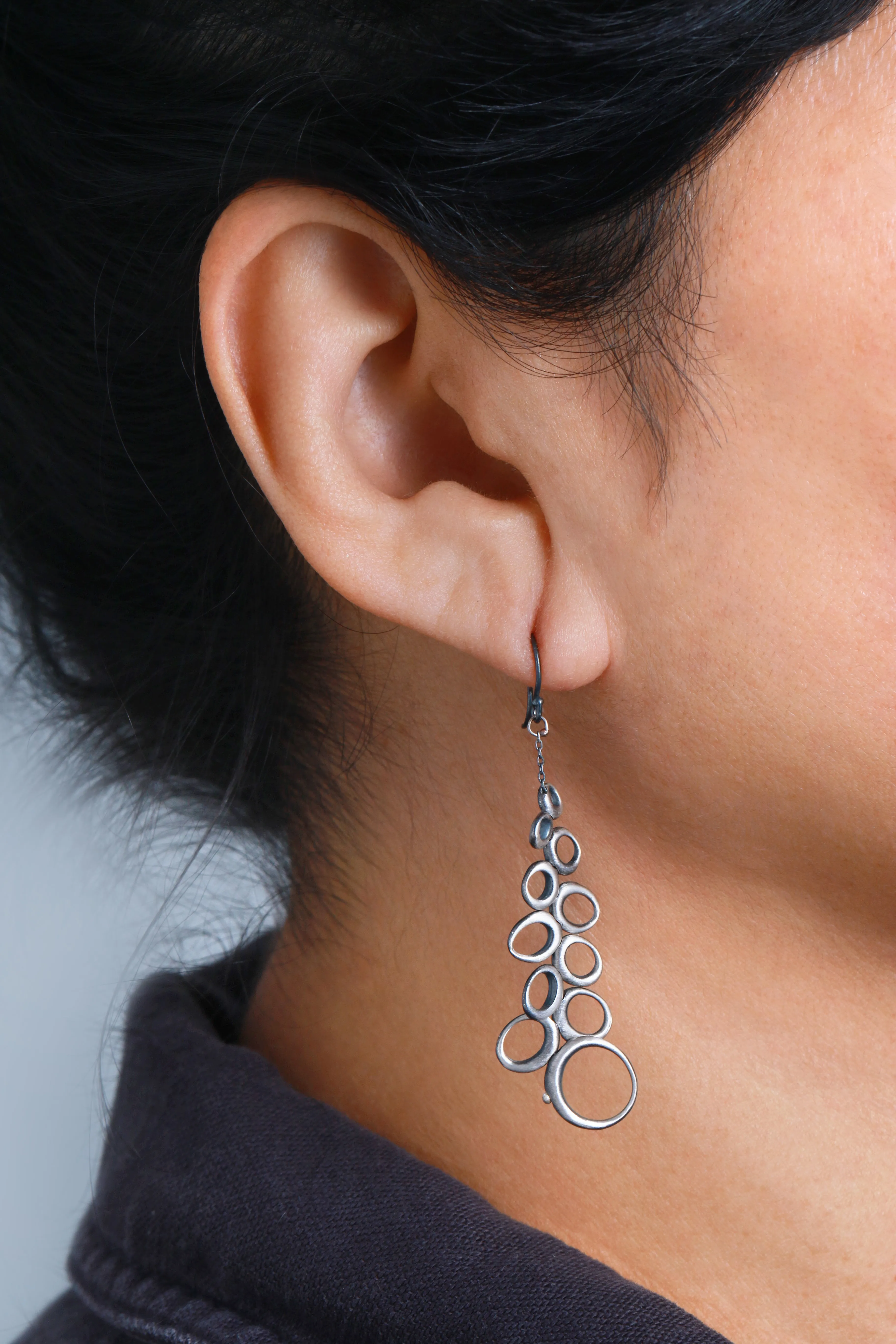 Sterling Silver Long Dancing Oval Earrings by TenThousandThings
