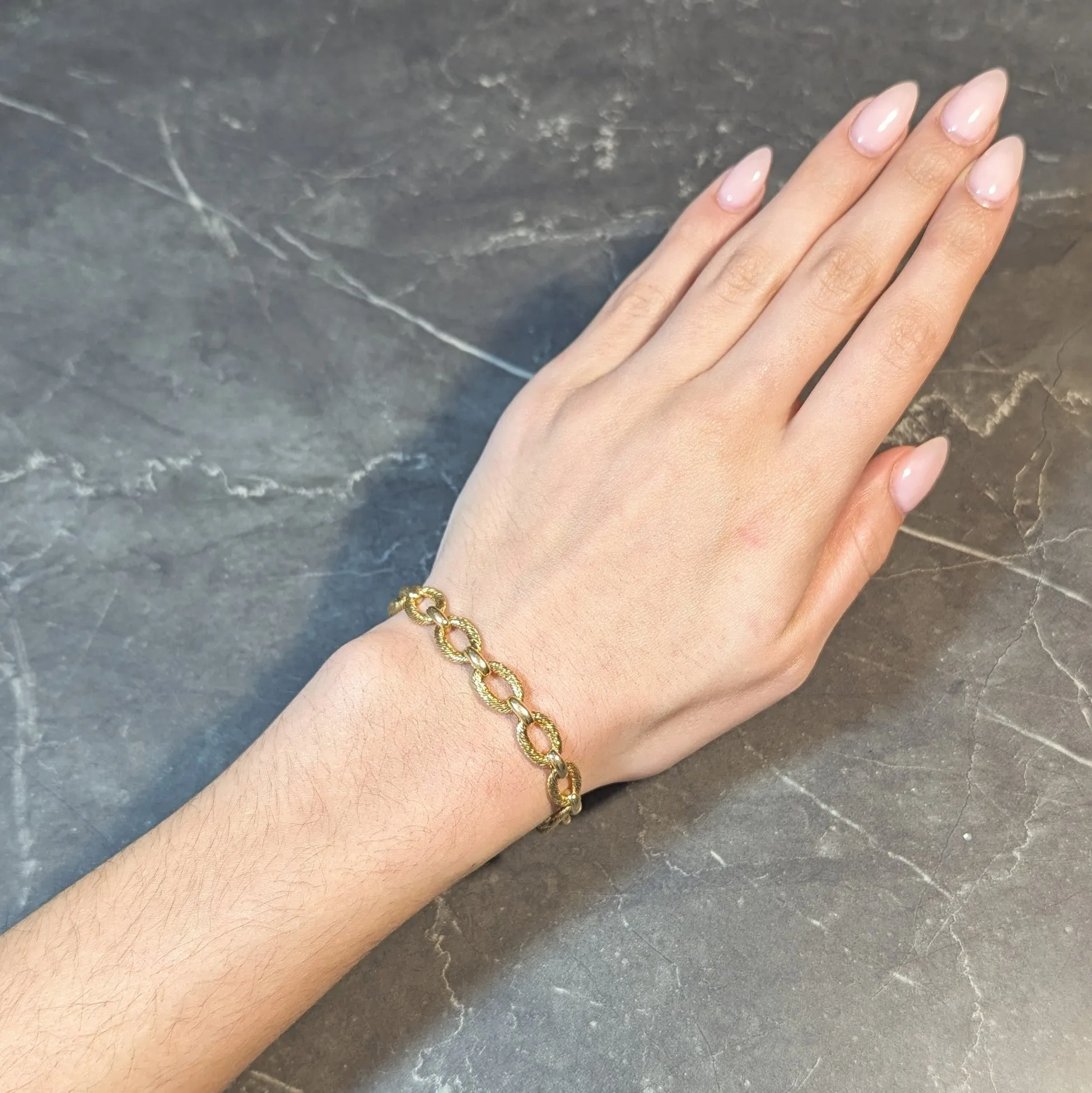 Tiffany & Co. French 1960s 18 Karat Yellow Gold Textured Vintage Oval Link Bracelet